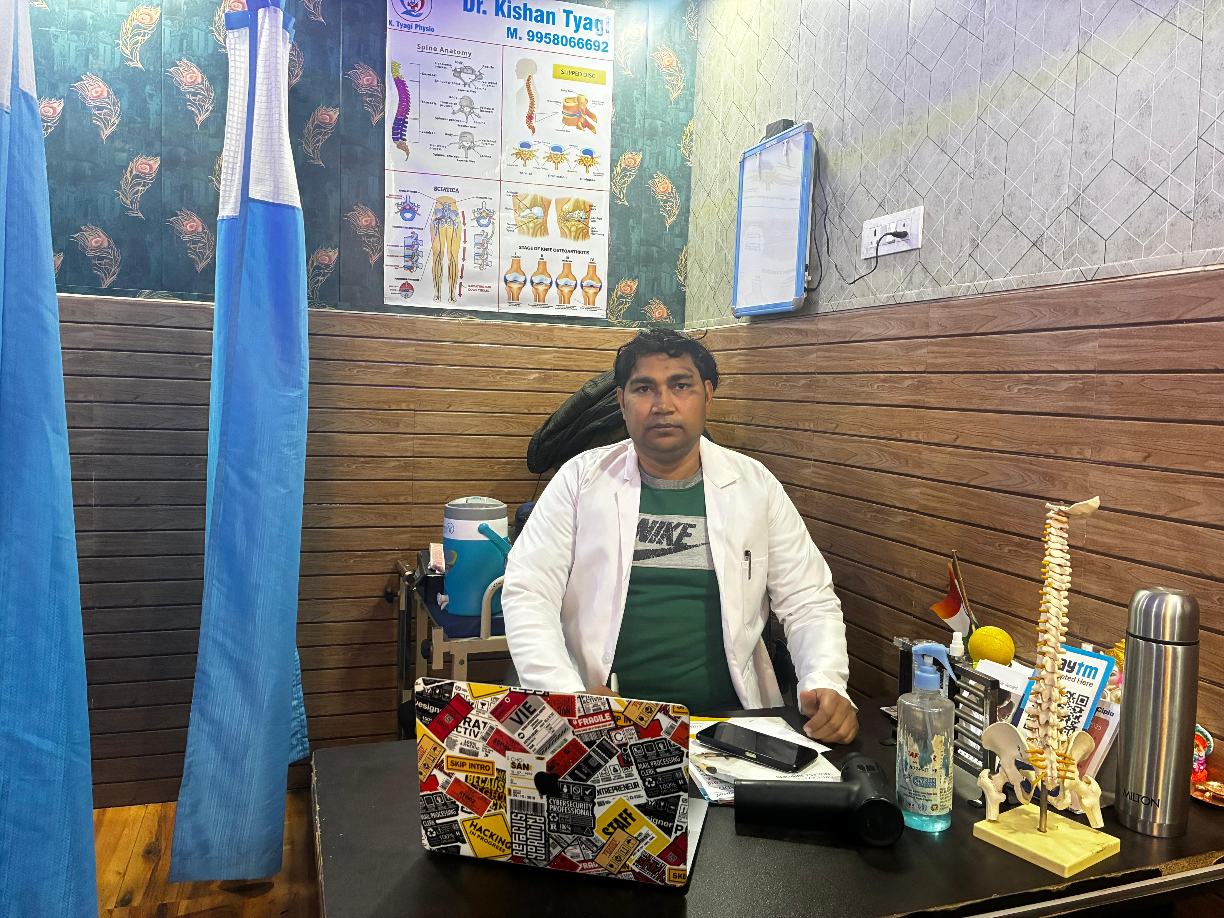 Dr. Kishan Tyagi performing manual therapy adjustment